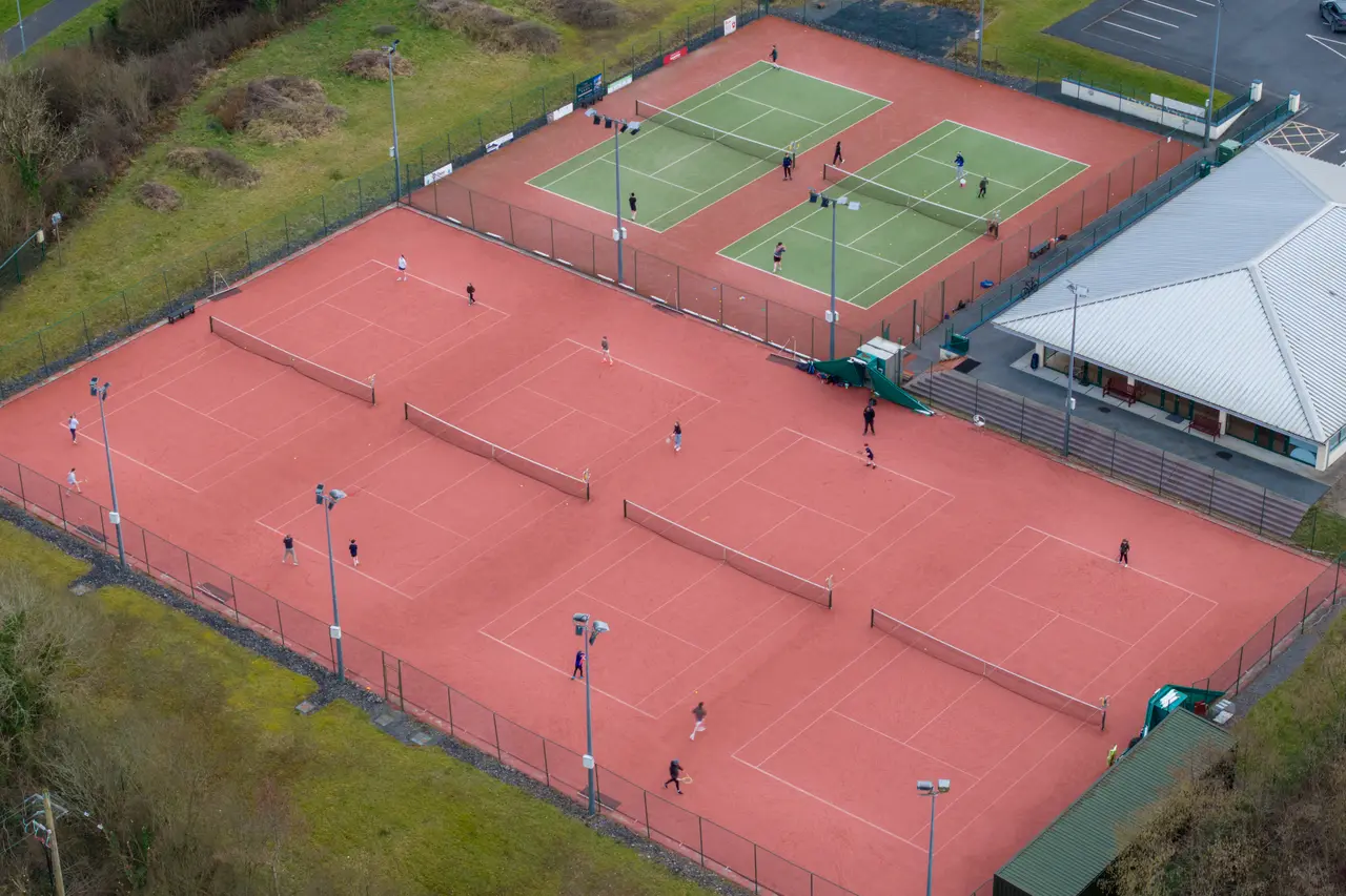 Aerial view of tennis courts in play